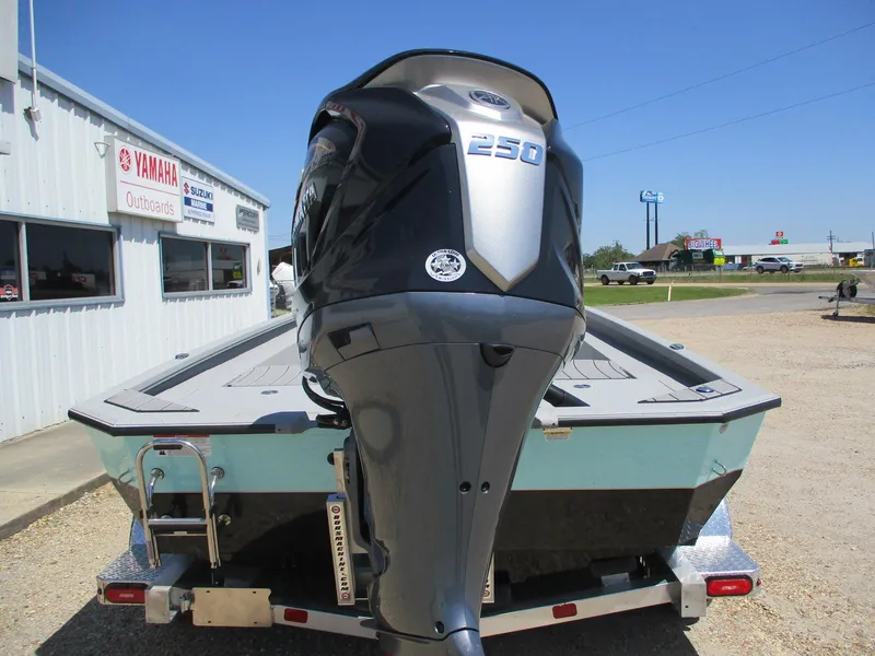 Slide: The Image of 2025 Vexus ACX 2210 boat with Yamaha 250 outboard motor on trailer. - 5