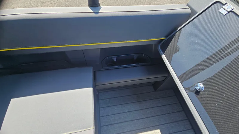 Slide: The Image of 2025 Manitou 24' Explore MAX Deck interior with sleek seating and storage. - 36