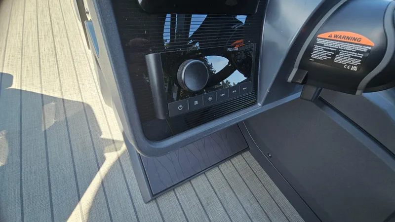 Slide: The Image of 2025 Manitou 24' Explore MAX Deck Navigator control panel with 150hp Rotax Stealth Motor. - 41