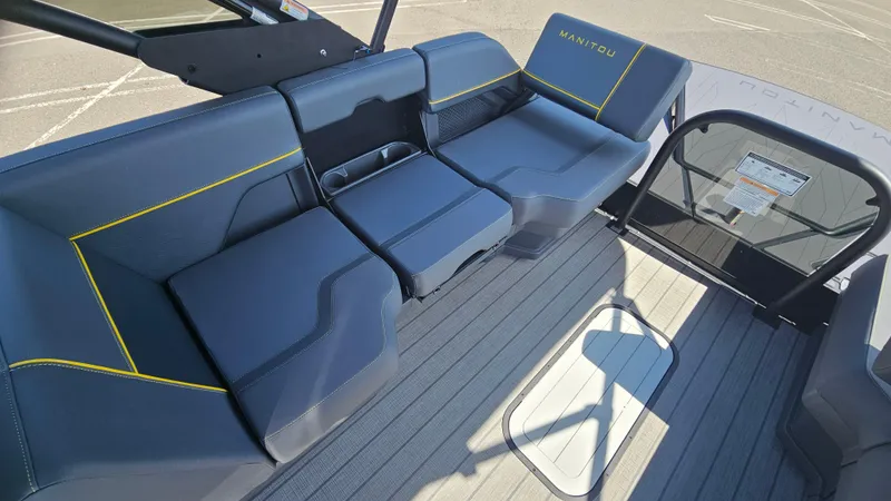 Slide: The Image of 2025 Manitou 24' Explore MAX Deck with sleek seating and modern design. - 43