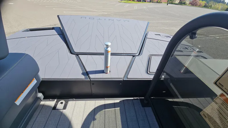 Slide: The Image of 2025 Manitou 24' Explore MAX Deck with 150hp Rotax Stealth Motor, sleek design. - 47