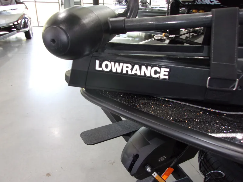 Slide: The Image of 2025 Skeeter FXR-20 Pro boat with Lowrance equipment in showroom. - 12