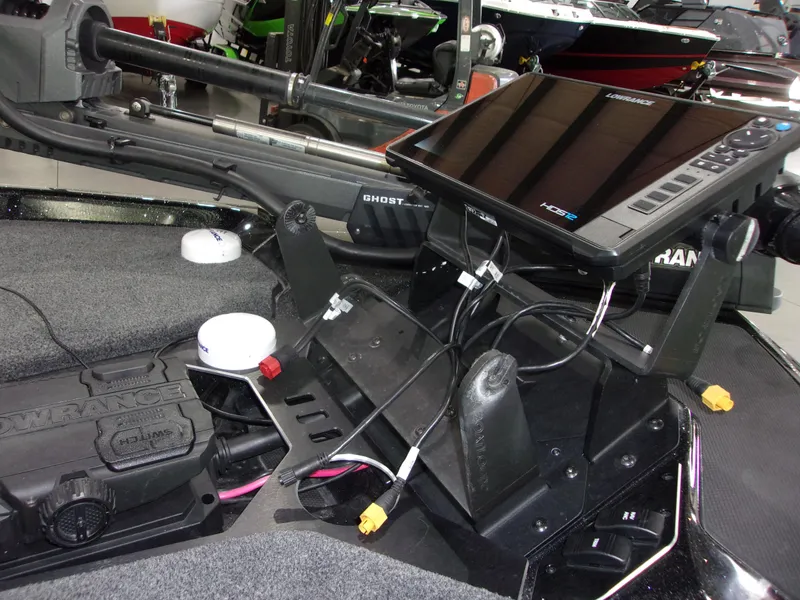 Slide: The Image of 2025 Skeeter FXR-20 Pro boat dashboard with advanced electronic display and control panel. - 15