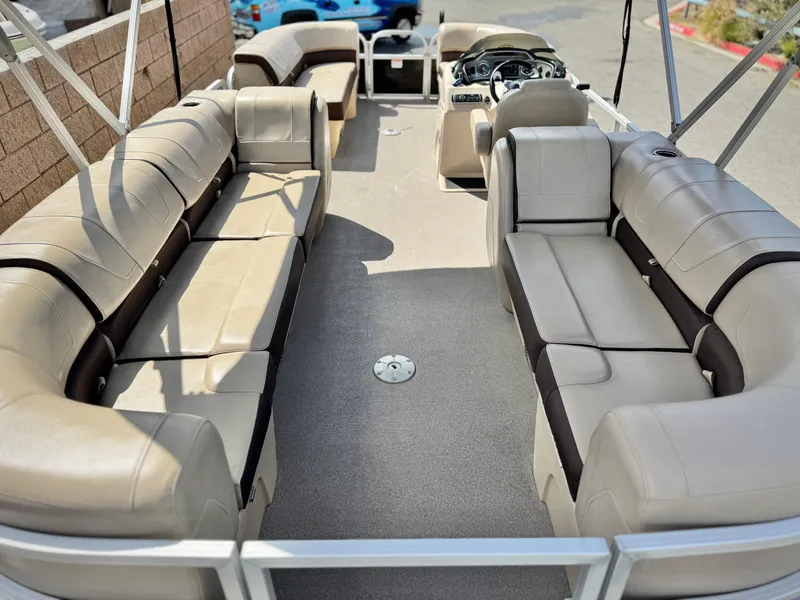Slide: The Image of 2018 Sun Tracker Party Barge 22 DLX with spacious seating and modern interior design. - 17