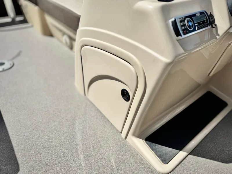 Slide: The Image of 2018 Sun Tracker Party Barge 22 DLX interior console with stereo system. - 21