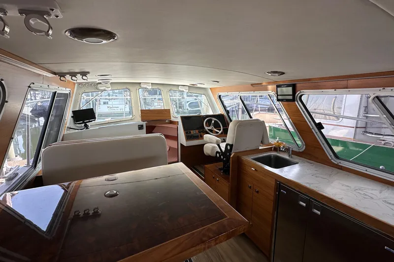 Slide: The Image of Interior of 2020 Coastal Craft 33 ProFish boat with modern helm and seating area. - 25