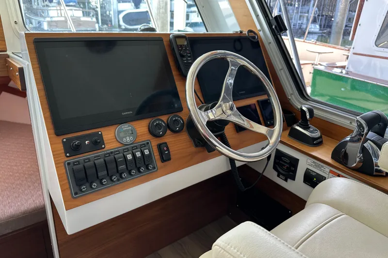 Slide: The Image of 2020 Coastal Craft 33 ProFish helm with modern controls and navigation equipment. - 35
