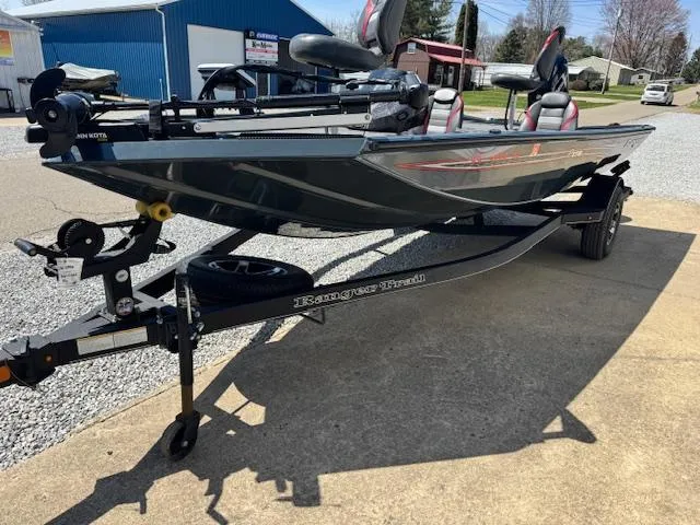 Slide: The Image of 2023 Ranger RT178 fishing boat on trailer, parked outdoors. - 10