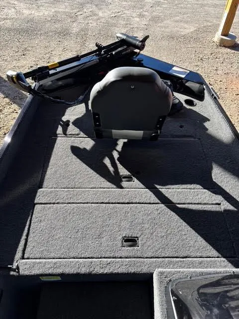 Slide: The Image of 2025 Lowe Skorpion 17 boat interior with seating and storage compartments. - 10