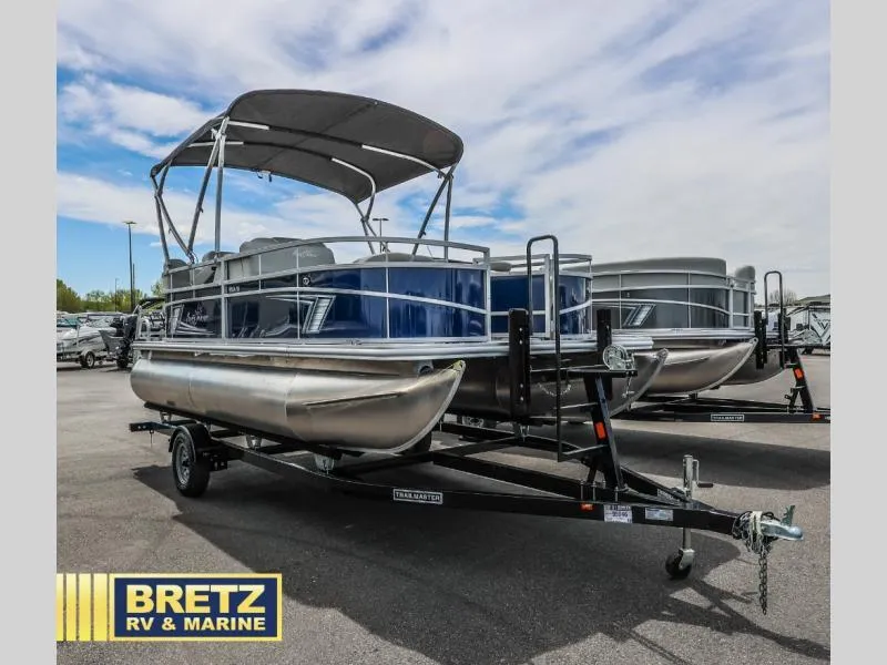 Slide: The Image of 2025 Vista Fish 18 pontoon boat on trailer at Bretz RV & Marine dealership. - 1