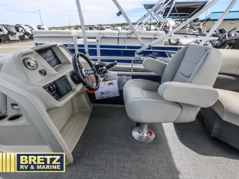 Slide: The Image of Captain's seat and helm of 2025 Vista Fish 18 boat at Bretz RV & Marine. - 11
