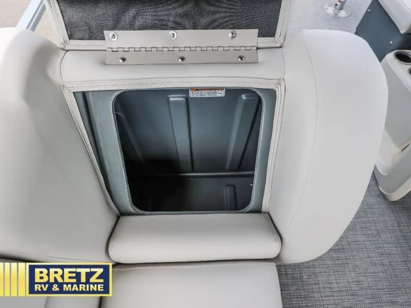 Slide: The Image of Open storage compartment in 2025 Vista Fish 18 boat seat. - 16