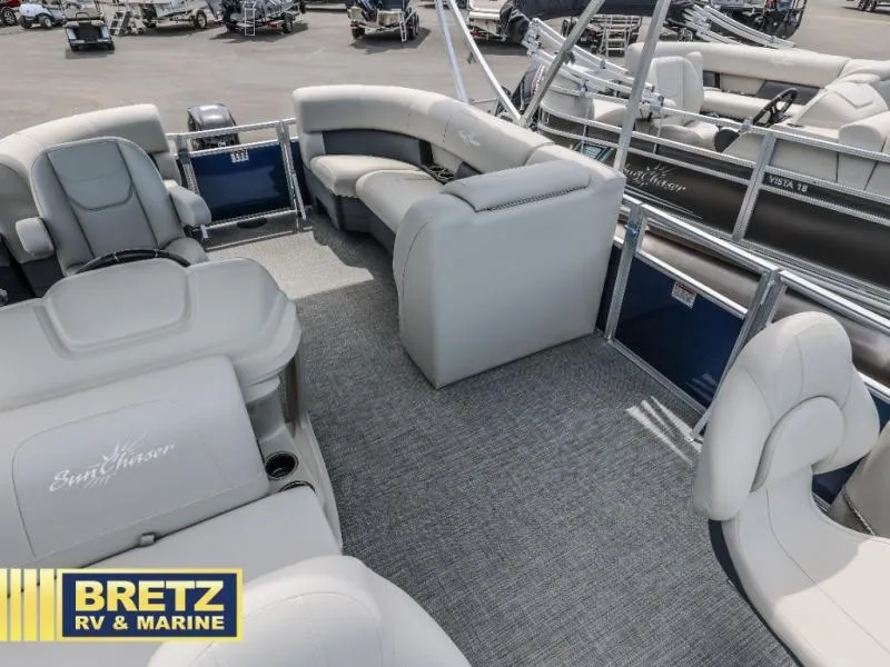 Slide: The Image of 2025 Vista Fish 18 pontoon boat interior with gray seating, showcased at Bretz RV & Marine. - 18