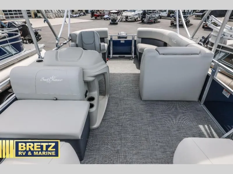 Slide: The Image of 2025 Vista Fish 18 boat interior with gray seating, spacious layout, and Bretz RV & Marine logo. - 8