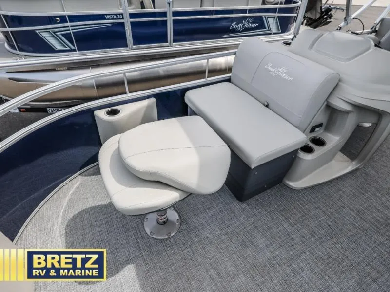 Slide: The Image of 2025 Vista Fish 18 boat interior with seating and cup holders at Bretz RV & Marine. - 9