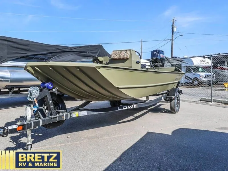 Slide: The Image of 2025 Roughneck RX1860 Tunnel Jet boat on trailer at Bretz RV & Marine. - 3
