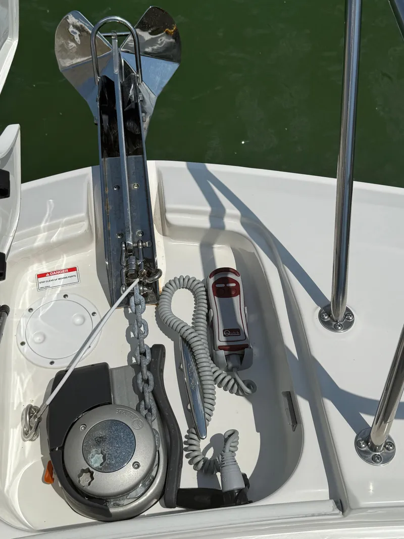 Slide: The Image of Anchor system on 2022 Sea Ray Sundancer 320 OB boat, featuring chain and control panel. - 9