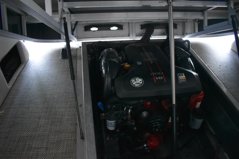 Slide: The Image of 2013 Bennington 2575 QCW I/O boat engine compartment with V8 engine. - 25