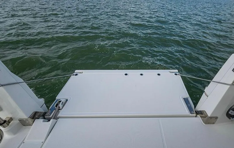 Slide: The Image of 2021 Jeanneau Leader 12.5 WA swim platform with ocean view. - 19