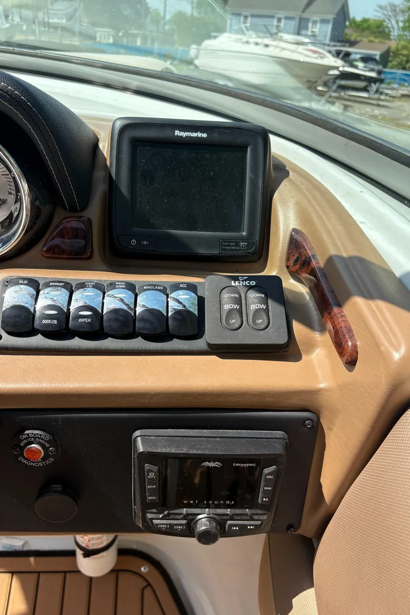 Slide: The Image of Control panel of 2017 Crownline 285 SS boat with navigation and audio systems. - 16