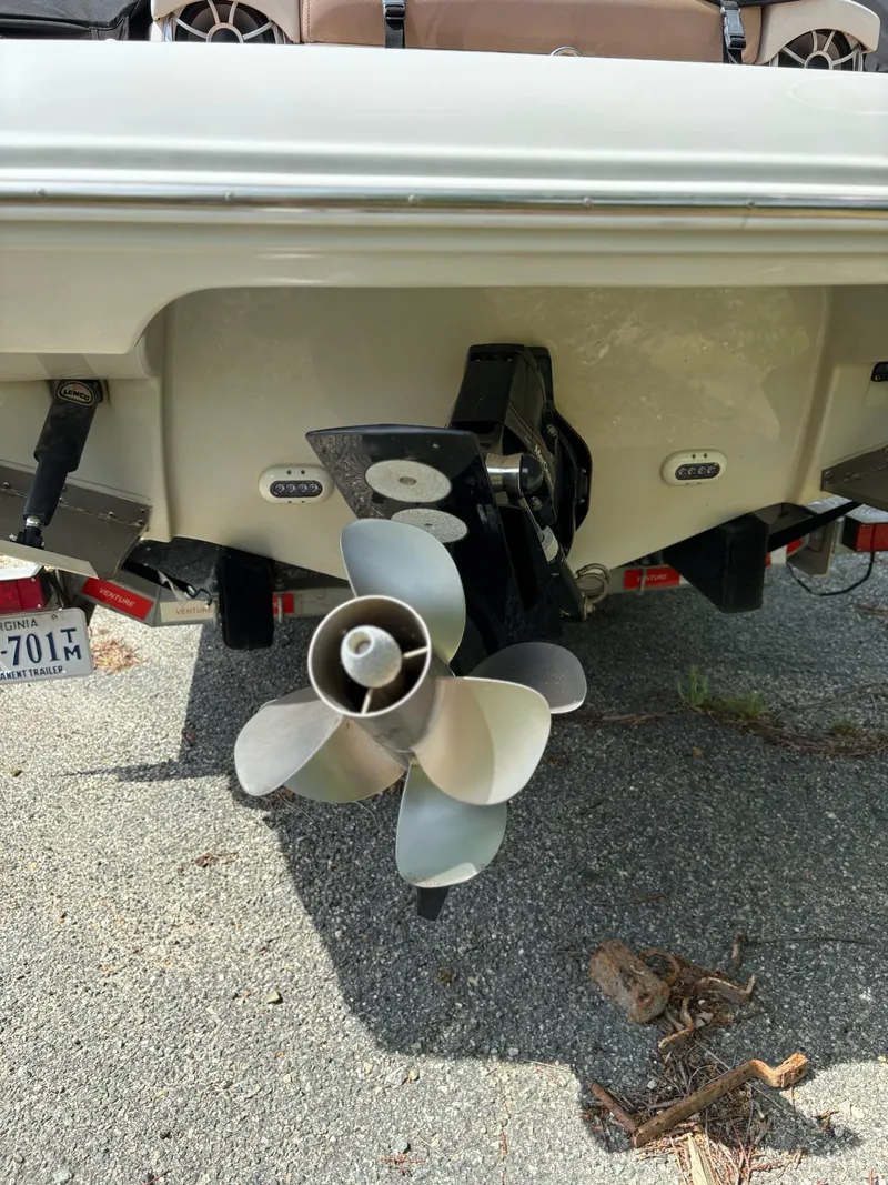 Slide: The Image of 2017 Crownline 285 SS boat stern with propeller and outdrive visible. - 8