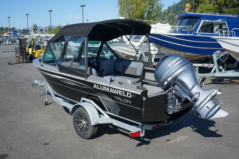 Slide: The Image of 2024 Alumaweld Talon 18 boat with Yamaha outboard motor on trailer. - 3