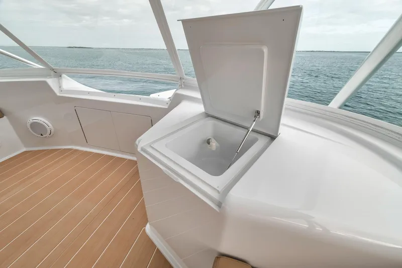Slide: The Image of Open sink on 2001 Viking 65 yacht deck with ocean view. - 25