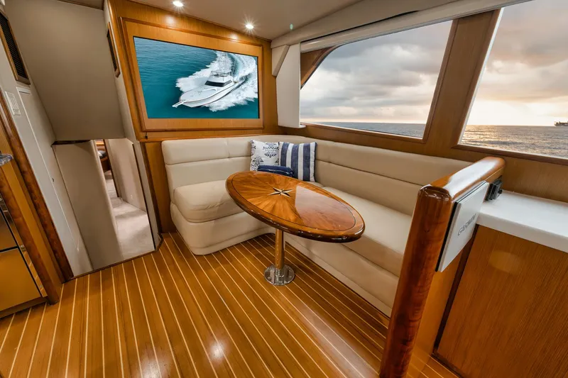 Slide: The Image of Luxurious interior of 2001 Viking 65 yacht with elegant seating and ocean view. - 39