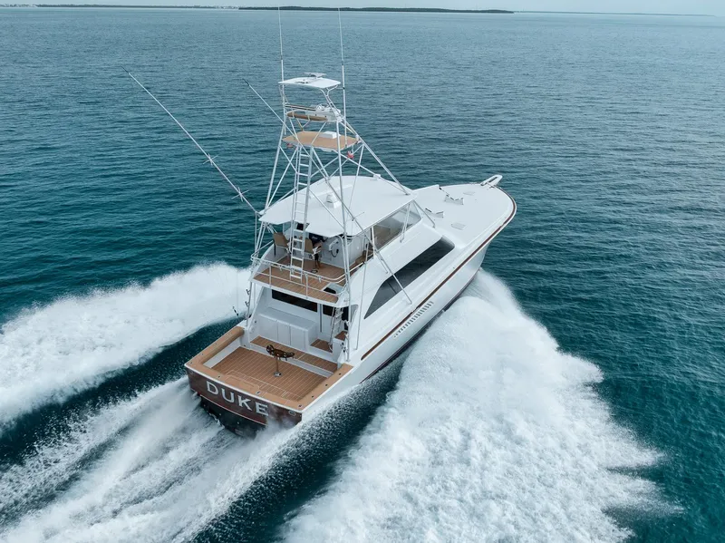 Slide: The Image of Viking 65 yacht cruising on open water, 2001 model, aerial view. - 5