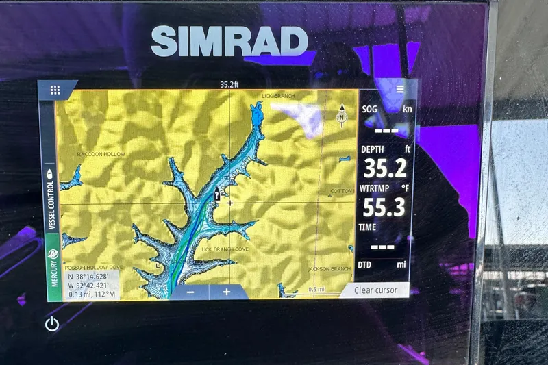 Slide: The Image of Simrad navigation display on 2019 Harris Solstice 240 showing depth and water temperature. - 15