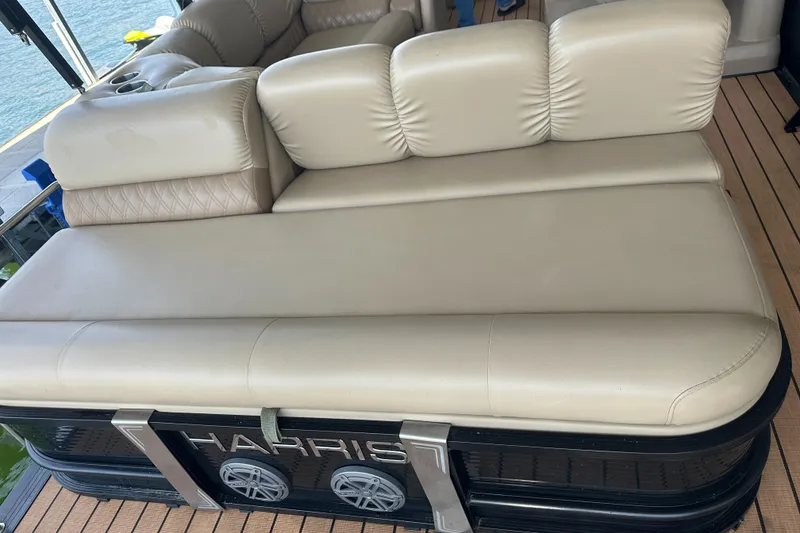 Slide: The Image of Luxurious seating on 2019 Harris Solstice 240 pontoon boat with beige upholstery. - 21