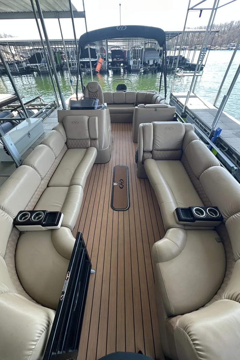 Slide: The Image of 2019 Harris Solstice 240 pontoon boat with spacious seating and elegant interior design. - 22
