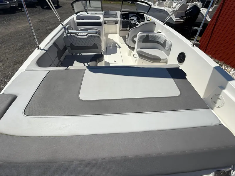 Slide: The Image of 2022 Bayliner VR6 Bowrider OB interior with spacious seating and modern design. - 18