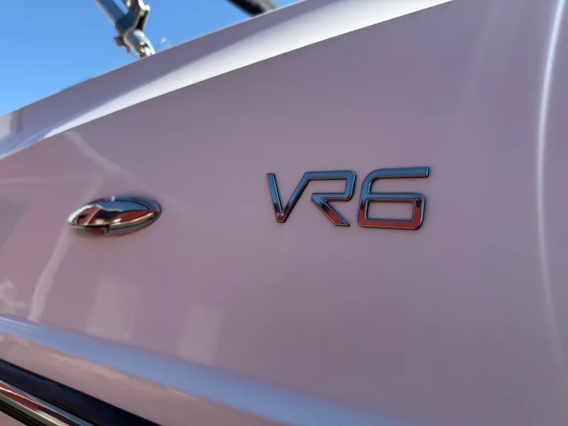 Slide: The Image of 2022 Bayliner VR6 Bowrider OB boat emblem on white hull. - 21
