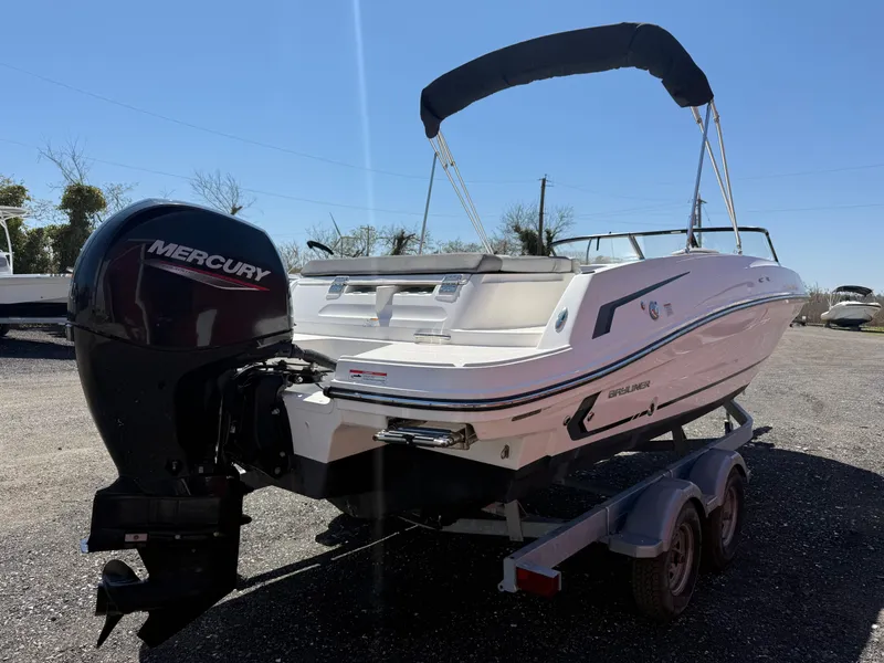 Slide: The Image of 2022 Bayliner VR6 Bowrider OB with Mercury outboard engine on trailer. - 5