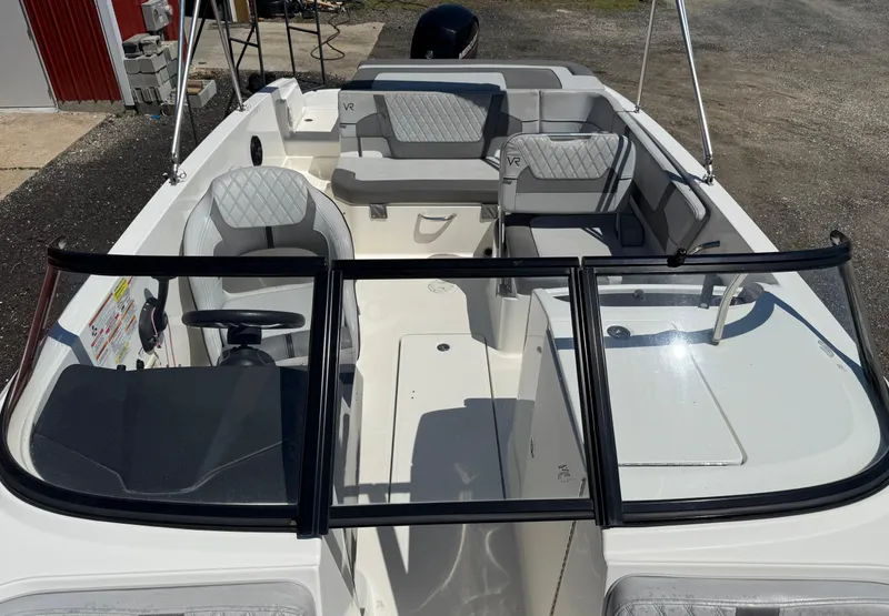 Slide: The Image of 2022 Bayliner VR6 Bowrider OB with spacious seating and modern design. - 9