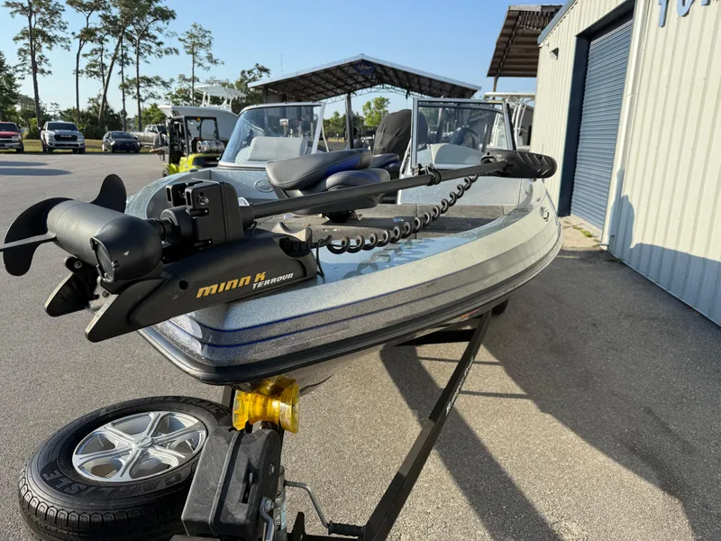 Slide: The Image of 2017 Ranger 212LS Reatta boat with Minn Kota trolling motor on trailer. - 3