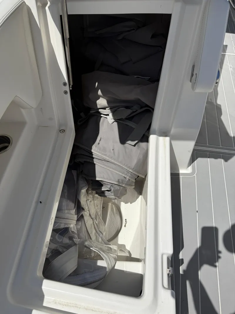 Slide: The Image of 2021 World Cat 280 DC-X boat interior with spacious seating and modern design. - 16