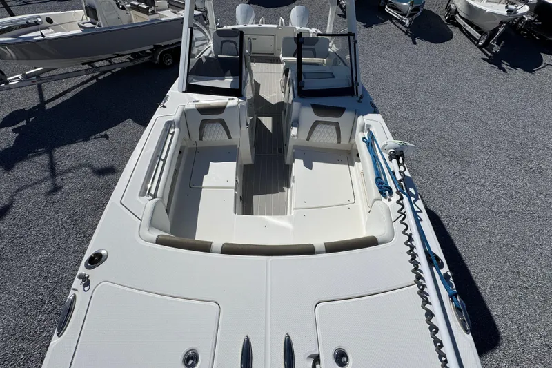 Slide: The Image of 2021 World Cat 280 DC-X boat interior with seating and deck view. - 18