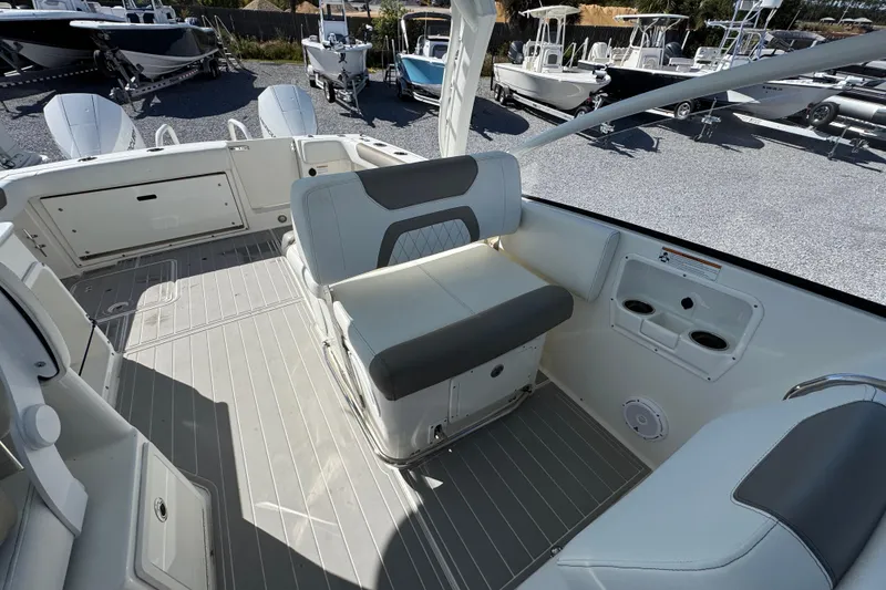 Slide: The Image of Interior of 2021 World Cat 280 DC-X boat with seating and cup holders. - 22