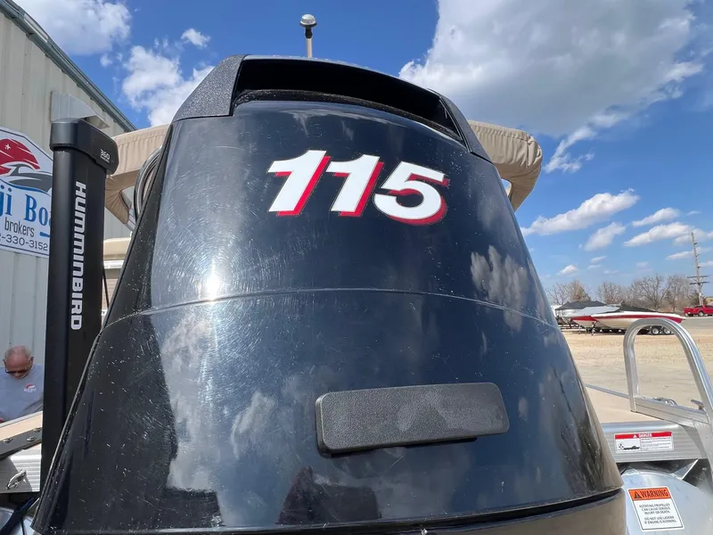 Slide: The Image of 2012 Bennington 24 SL boat with 115 horsepower engine, featuring Humminbird equipment. - 5