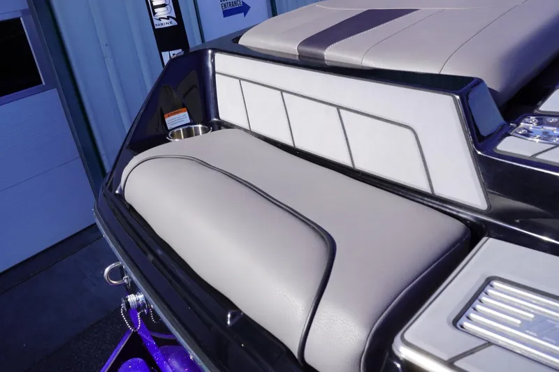 Slide: The Image of 2022 Malibu Wakesetter 23 LSV boat interior with sleek seating and modern design. - 14