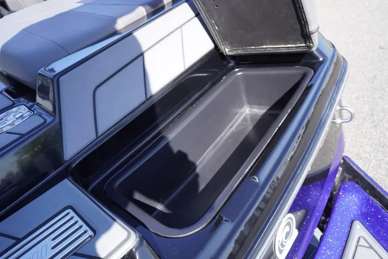 Slide: The Image of Open storage compartment in 2022 Malibu Wakesetter 23 LSV boat. - 17