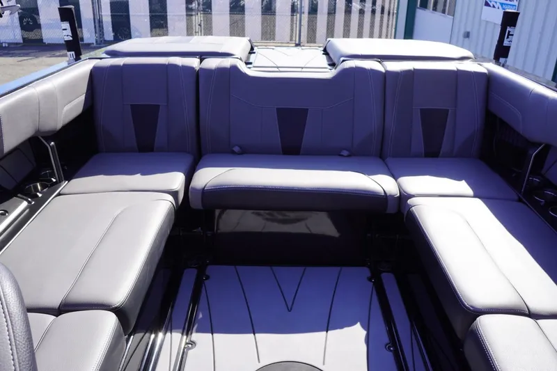 Slide: The Image of 2022 Malibu Wakesetter 23 LSV interior with spacious, luxurious seating arrangement. - 23