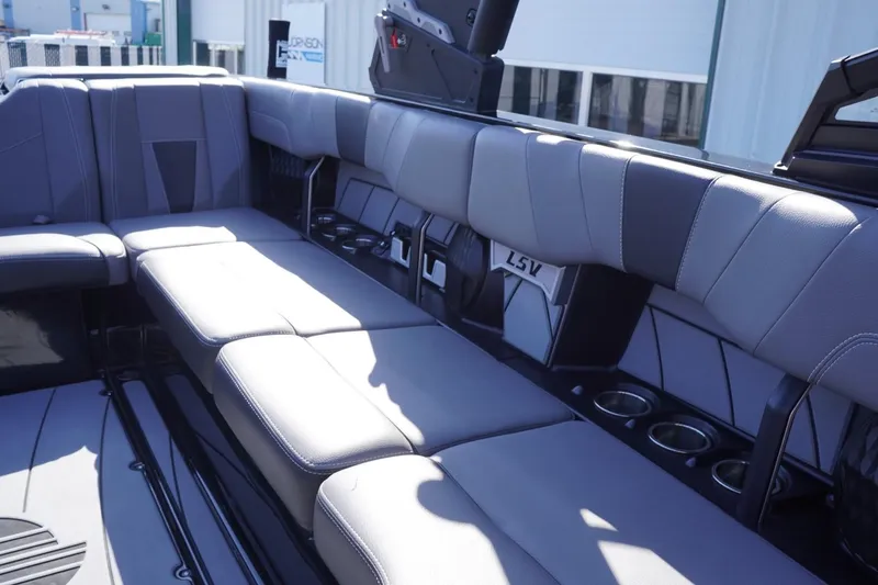 Slide: The Image of 2022 Malibu Wakesetter 23 LSV interior with spacious seating and cup holders. - 30