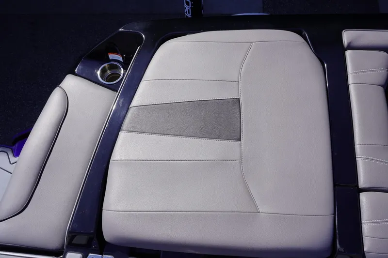 Slide: The Image of 2022 Malibu Wakesetter 23 LSV boat seat with sleek, modern design and cup holder. - 38