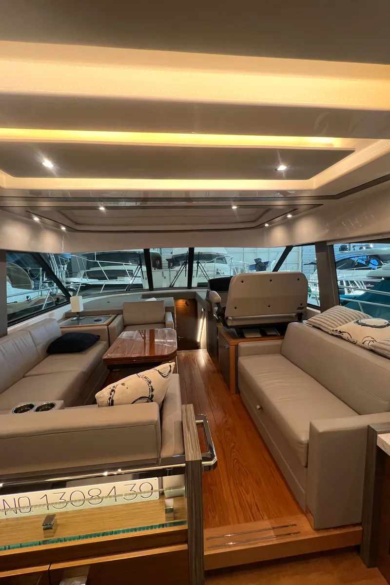 Slide: The Image of Luxurious interior of 2020 Tiara Yachts C53 Coupe with elegant seating and modern design. - 13