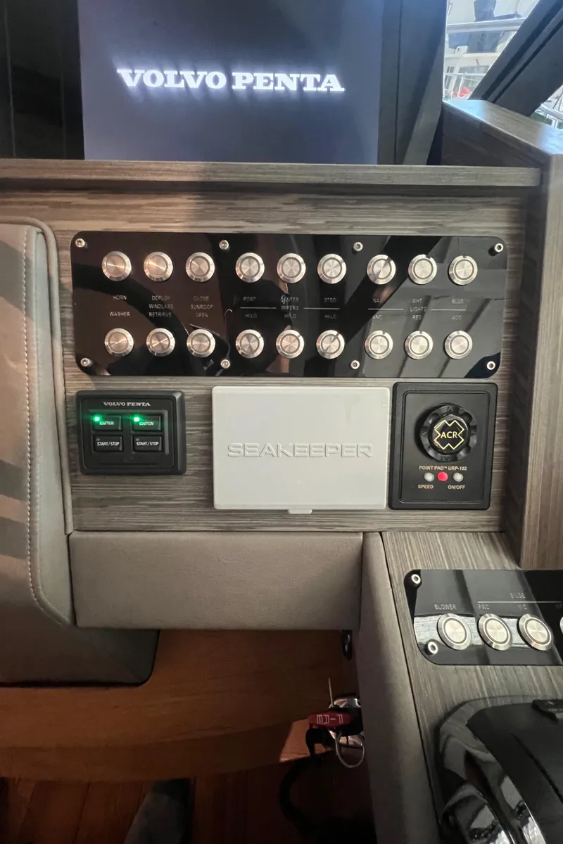 Slide: The Image of Control panel of 2020 Tiara Yachts C53 Coupe featuring Volvo Penta and Seakeeper systems. - 36