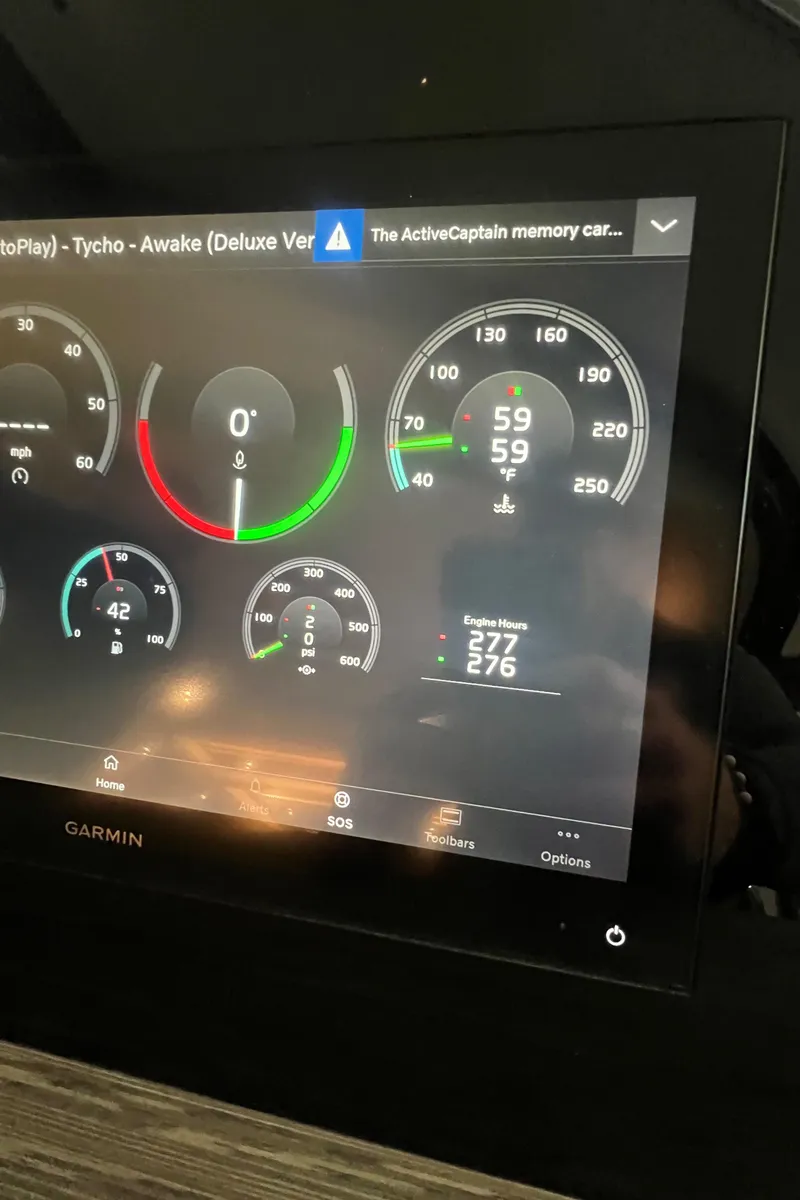 Slide: The Image of Dashboard display of a 2020 Tiara Yachts C53 Coupe with Garmin interface. - 8