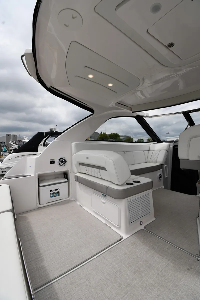 Slide: The Image of 2021 Regal 35 Sport Coupe interior with sleek seating and modern design. - 21